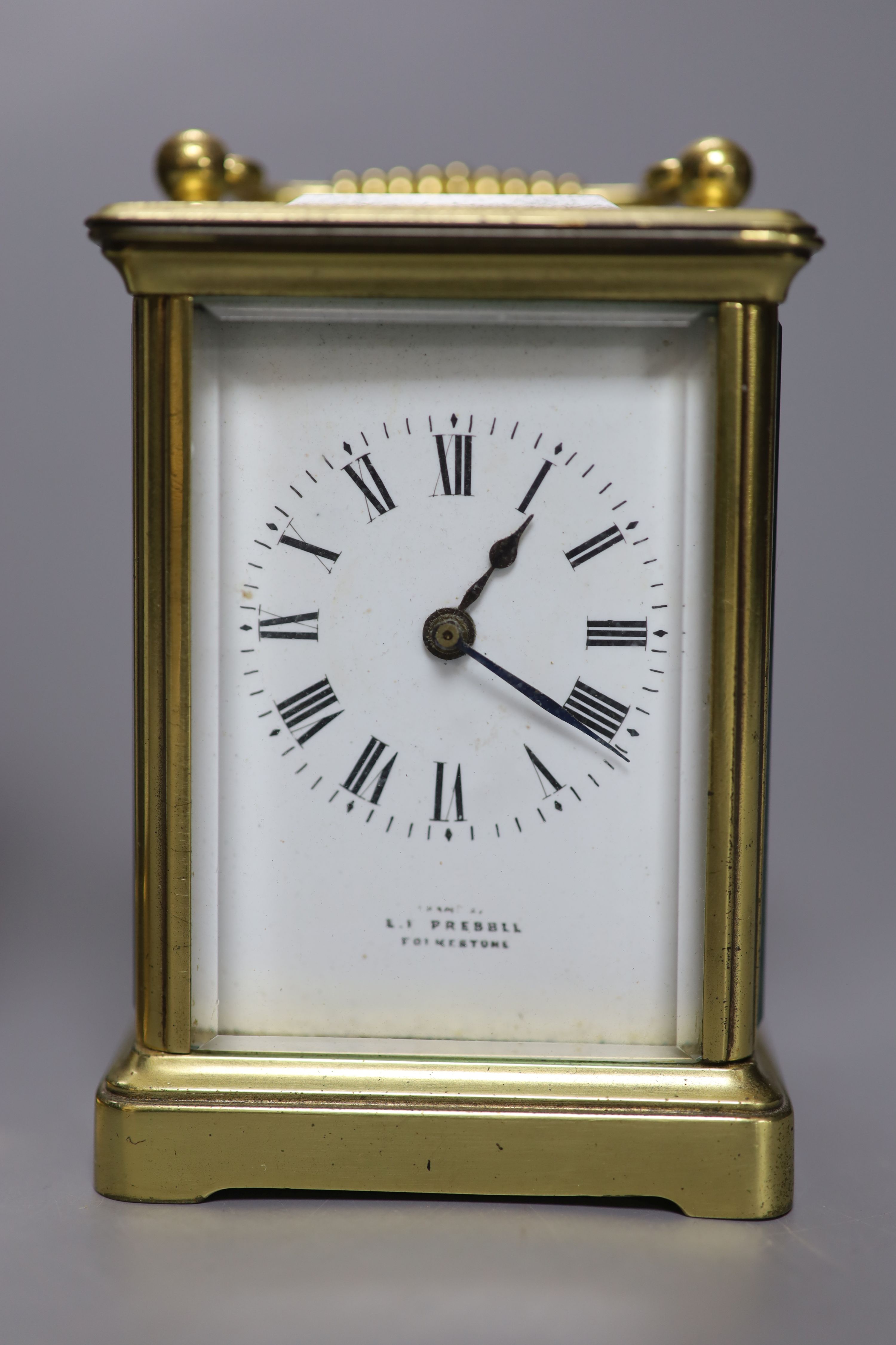 Two French brass eight day carriage timepieces, one with alarm, tallest 13cm with handle down